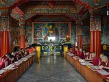 Pokhara Karma Dubgyu Chokhorling Monastery 07 Monks In The Main Prayer Hall With Gilded Shakyamuni Buddha Statue 